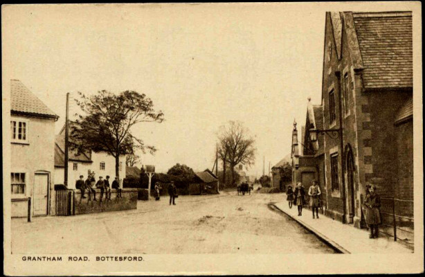 An old postcard of Grantham Road with the Red Lion on the left and the village school on the right | Terry Wing
