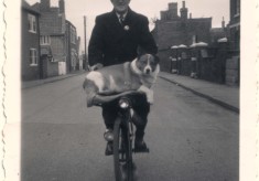 Arthur Wing, postman, on bike, Queen St