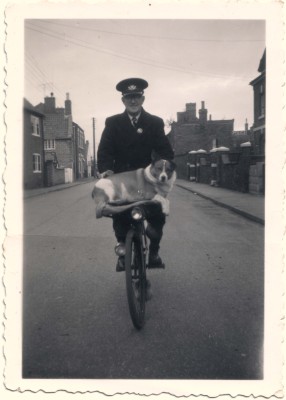 Grandad Arthur Wing with Jackie riding along Queen St, Bottesford, on the GPO bicycle | Terry Wing