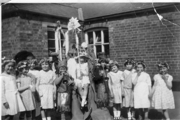 Village school children celebrating May Day in school yard | Contributed by Miss Margaret Waudby
