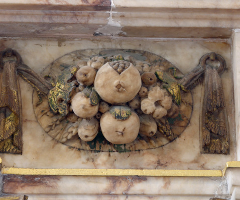 A bunch of fruit, believed to be pomegranates, displayed on the tomb of the 6th Earl of Rutland | Neil Fortey