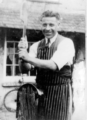 Mr Taylor, butcher, outside the family shop on Bottesford Market Place | Neil Fortey