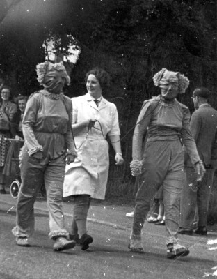 Fancy dress ladies in May Day parade