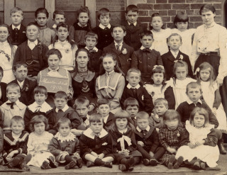 The right hand half of the 1902 Muston School photograph - George Challands is the thoughtful child seen 4th from the right in the second row from the front. | From the collection of Mr Alan Hodgkinson