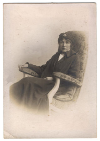 Kathleen Porter in her nurse's cape and uniform. The cap badge displays the Red Cross of the VADs. | Courtesy of the family archive of Mrs Rosemarie Greenhalf.