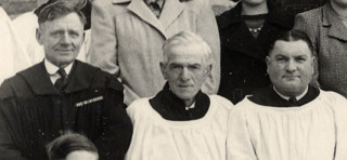 Harry Tinkler, flanked by fellow ex-WW1 servicemen Harry Bugg (to his left) and Tommy Robinson (to his right), in a church choir picture, c.1950. | From the private collection of Miss Margaret Taylor