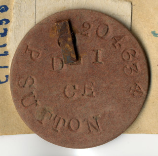 Philip Sutton tag #2 A close up picture of Private Philip Sutton's identity tag. | Private collection