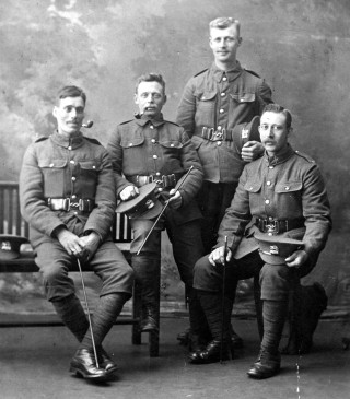 BOT026_025_Percy Allcorn on R_02 Recruitment photograph taken in the photographer's studio - Percy Allcorn is sitting, on the right. | From the private collection of Mrs Jill Bagnall.