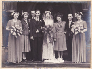 Dawson_Norman_IanMcCraight_0005_02 A family wedding, c.1950, St Andrew's, Nottingham. Norman Dawson is standing to the left of Doris. | By courtesy of Mr Ian McCraight, Norman Dawson's grand-son.