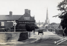 Postcard of Market Place showing Bugg's butchers shop.