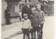 Queen St, c.1933 - Evelyn Marston with sons Vic, Frank and John