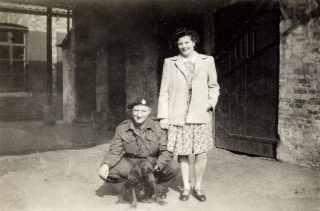 Mr Fred Carter and daughter Jean, at the rear of The Bull, Bottesford, during the war. | Bottesford Local History Archive