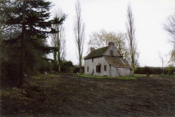 A view of the Lock House from the north, during removal of the grassy turf that had surrounded the building.