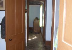 Looking along the ground floor from the dininng room to the living room.