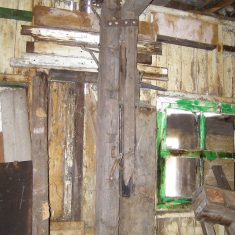 Construction of the sheds, improvised, incorporating an old telegraph post! BOT196/101 | Neil Fortey