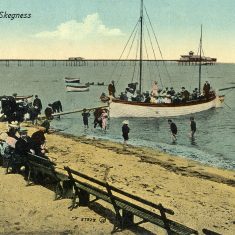 The beach at pre-WW1 Skegness, a pleasure boat preparing to start a cruise, the pier in the background. | From Janet Dammes' family archive.