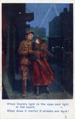 A First World War postcard showing a romantic scene during the blackout, perhaps in London, or could it be Paris? | From Janet Dammes' family archive.