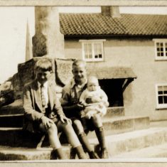 BOT177_005 Marston album1 05 #2 Arthur and Eve's children at the Cross: Vic (left) and Frank (right); Frank holding baby Daphne. | Janet Dammes
