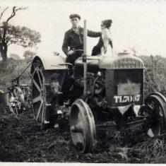BOT177_039 Marston album2 03 Frank Marston 1942, at work with tractor and dog.