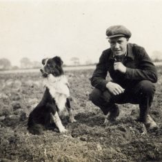 BOT177_040 Marston album2 04 Frank Marston 1942, at work with tractor and dog.