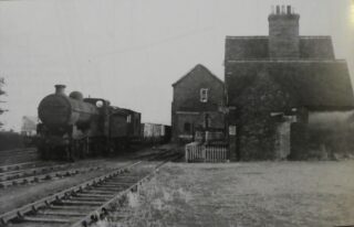 Bottesford for Belvoir - slide 18 A goods train passing the station house at the Canal Wharf station at Grantham, photographed by J.P. Wilson in August 1953. | Reproducedin Alfred Henshaw, 'The Great Northern Railway in the East Midlands', p.56.