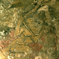 A demon pushes sinners into the mouth of Hell. | Neil Fortey