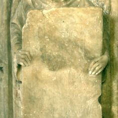 One of the angel panels of the tomb of Sir John de Roos: there are traces of the original red paint on his left wing. | Neil Fortey