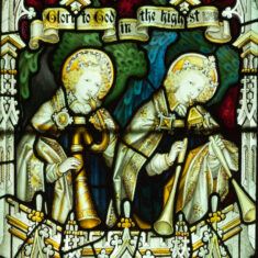 P1090921_02 Part of the Nativity window in the Lady Chapel - angels and worshippers at the birth of Christ. Angels announce the Nativity on medieval instruments. | Neil Fortey