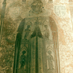 P1100125_02 Henry de Codyngtoun, Rector of Bottesford (1361-1381). The brass, in the floor of the chancel by the tomb of the 2nd Earl, is noted for the rich embroidery on the cope depicting saints including Peter, Paul, John the Evangelist, Margaret, Catherine, Thomas of Canterbury and James of Compostela. | Neil Fortey
