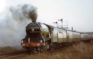 Picture 6 - Flying Scot The Flying Scotsman excursion train passing through Bottesford junction in 1984. | Photo by David Middleton, Bottesford Local History Archive